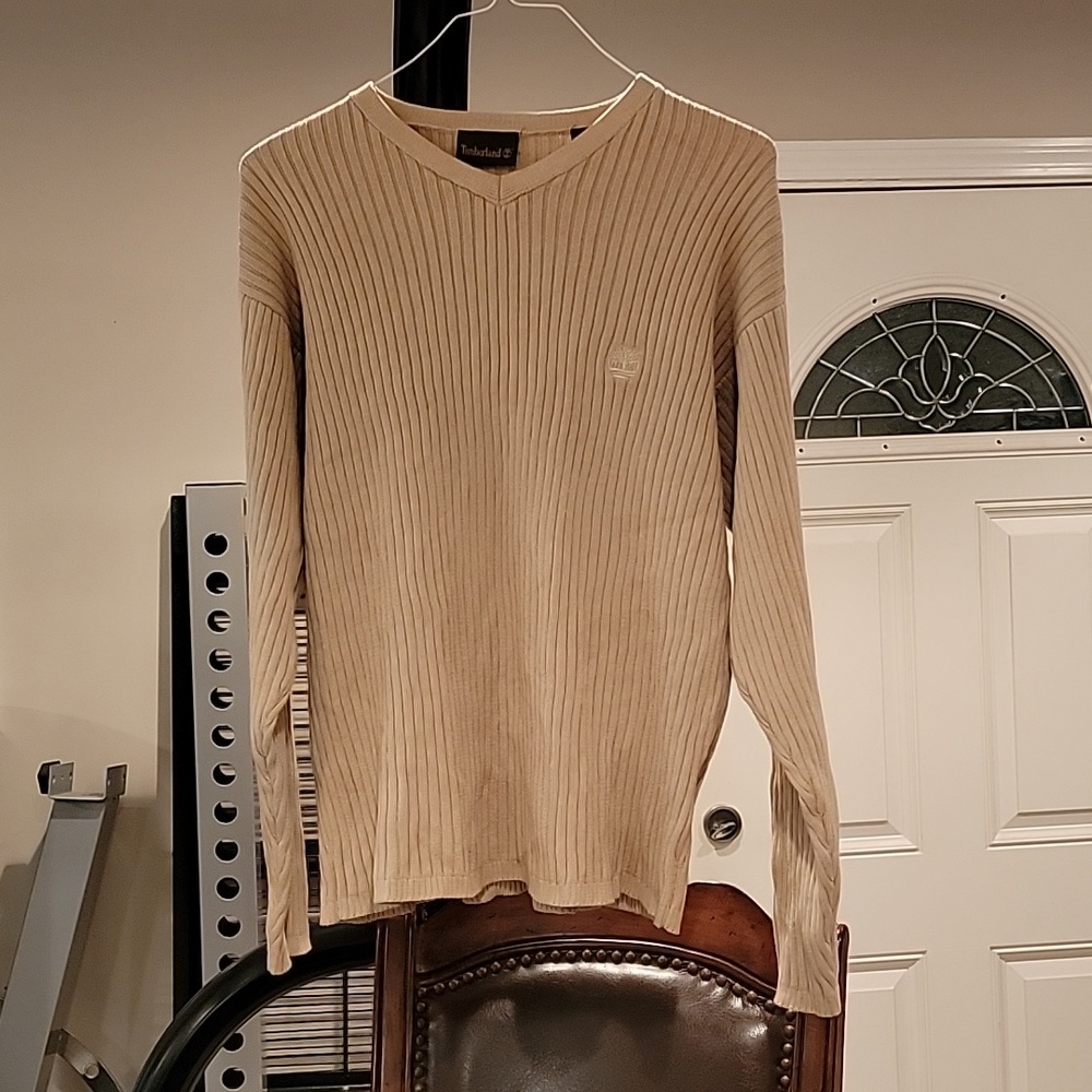 Old beige Timberland sweater. Maybe large (size tag not there).